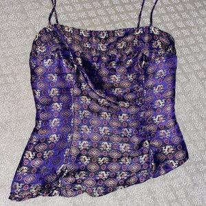 a-symmetrical purple fitted tank